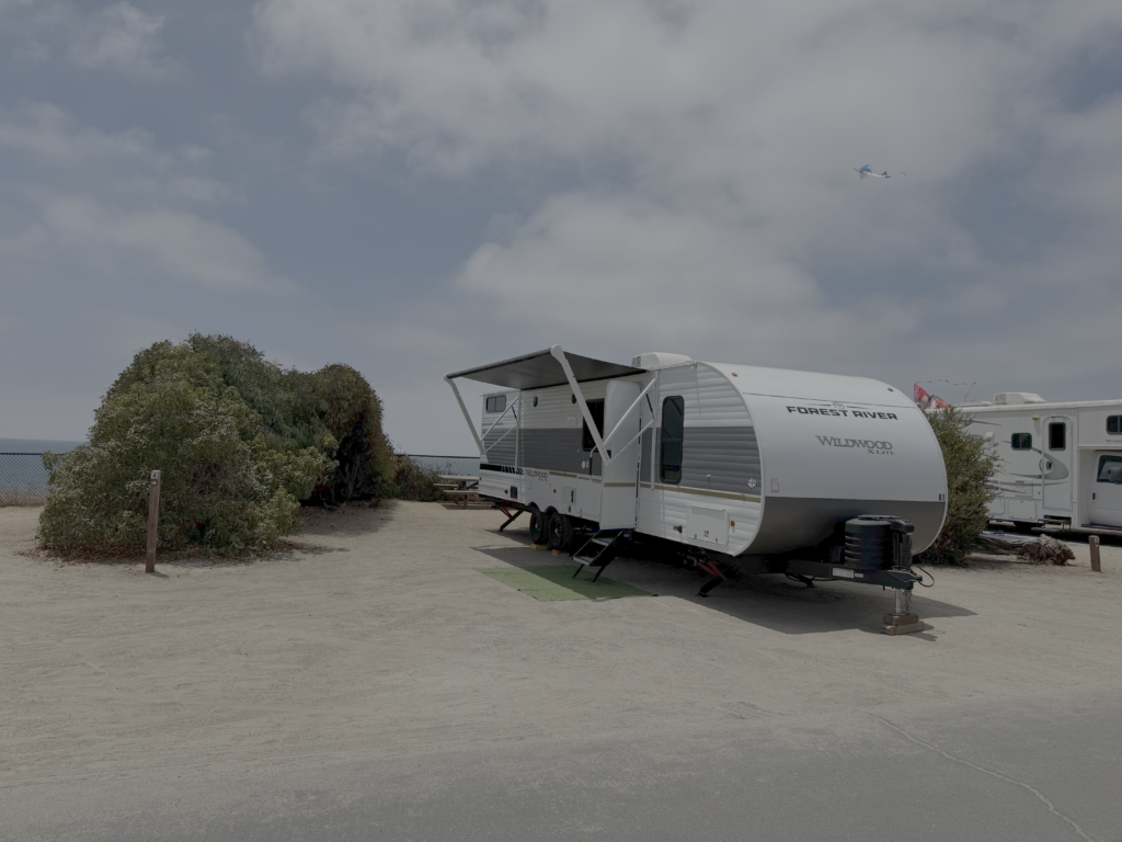 Travel trailer delivered and set up at a San Diego beach campsite